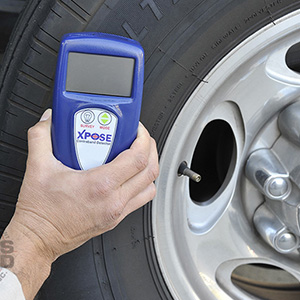 Density Meter Inspecting Tire