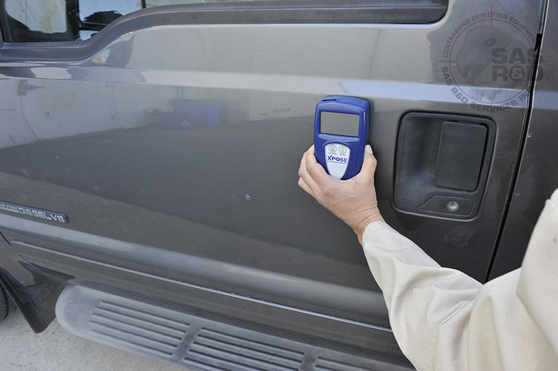 Xpose Inspecting Car Door